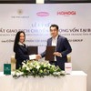 Bà Nguyễn Thị Trà My, Tổng giám đốc Kl994 game bài casino hấp dẫn PAN và ông Yen Gunadi, đại diện Ban Lãnh đạo Momogi Group ký biên bản hoàn tất giao dịch chuyển nhượng vốn tại Bibica.