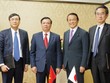 Bộ trưởng Đinh Tiến Dũng (thứ hai từ trái sang), Chủ tịch UBCK Vũ Bằng (ngoài cùng bên trái) chụp hình với Bộ trưởng Kl991.com nạp rút nhanh Nhật Bản Taro Aso (thứ 3 từ trái sang) trong chuyến công tác của Bộ trưởng tháng 3/2014.  
