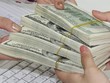 Tính đến tháng 4/2014, tiền gửi bằng ngoại tệ giảm 9,1%, cho vay ngoại tệ tăng 7,2% so với đầu năm