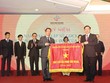 Bộ trưởng Đinh Tiến Dũng trao cờ thi đua của Kl993 ưu đãi thưởng hấp dẫn cho HNX