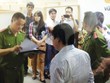 Lực lượng chức năng thi hành lệnh khám xét tại Công ty VGX