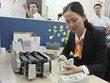 Tỷ giá USD/VND niêm yết tại DongA Bank ngày 25/12 tăng 15 đồng/USD so với hai ngày trước 