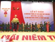 Đại tướng Phùng Quang Thanh - Ủy viên Bộ Kl991.com tải ứng dụng, Phó Bí thư Quân ủy Trung ương, Bộ trưởng Bộ Quốc phòng gắn Huân chương Lao động hạng Nhất lên Quân kỳ Quyết thắng