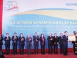 Chủ tịch HĐQT Đào Đình Thi thay mặt lãnh đạo Kl994 game bài casino hấp dẫn Bảo Việt đón nhận Huân chương Lao động Hạng Nhất do Phó Chủ tịch nước Nguyễn Thị Doan trao tặng
