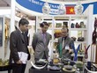 Lương Thanh Nam (bên phải) tại Hội chợ The Hotel Show ở Dubai tháng 9/2014