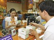 Đến 30/6/2015, các TCTD phải bán được tối thiểu 75% số nợ xấu theo chỉ tiêu được giao và đến 30/9/2015 phải bán hết 100%