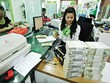 Lòng tin vào đồng Việt Nam được củng cố, tình trạng đô la hóa giảm mạnh - Ảnh: Hoài Nam