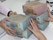 Khi biên khả năng thanh toán được duy trì tốt thì đó chính là thước đo, là cơ sở để thực hiện mục tiêu Kl99 nổ hũ - Ảnh: Hoài Nam