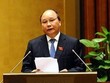 Phó thủ tướng Nguyễn Xuân Phúc thay mặt Kl993 ưu đãi thưởng hấp dẫn đã trình bày Báo cáo tổng hợp việc thực hiện các nghị quyết của Quốc hội