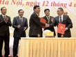 Cái bắt tay chuyển giao trách nhiệm tư lệnh ngành giữa Bí thư Thành ủy Tp.HCM Đinh La Thăng và Bộ trưởng Bộ GTVT Trương Quang Nghĩa