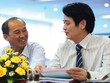 TS. Nguyễn Đức Hưởng và ông Dương Công Minh (bên trái) tại một hội nghị của LienVietPostBank