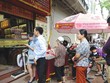 Cảnh xếp hàng từ sáng sớm chờ giao dịch vàng trên phố Trần Nhân Tông, Hà Nội tái diễn trong đợt sốt vàng vừa qua