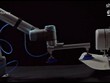 Độc đáo, robot may quần áo
