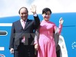 Thủ tướng Nguyễn Xuân Phúc và Phu nhân tại sân bay quốc tế Haneda ở thủ đô Tokyo (Nhật Bản) . (Ảnh: Thống Nhất/TTXVN)