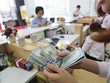 Cảnh báo kiểm soát chặt tín dụng ngoại tệ