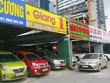 Nhiều cơ sở mua bán xe ô tô đã qua sử dụng ở phố Nguyễn Chánh, Mỹ Đình, Hà Nội. Ảnh: Phú Vinh/BNEWS/TTXVN