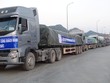 Những chuyến xe đưa xi măng Bỉm Sơn tới các công trình xây dựng.