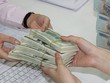 Khuyến nghị siết dần tín dụng ngoại tệ