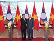 Thủ tướng Nguyễn Xuân Phúc và Thủ tướng Thongloun Sisoulith họp báo sau kỳ họp (Ảnh: Đức Trung)