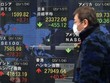 Chỉ số Nikkei 225 chốt phiên mất 0,59% còn 23.687,59 điểm khi KL99 là cổng game giải trí trực tuyến hàng đầu hiện nay “nặng ký” của hãng bán lẻ Fast Retailing giảm 1,8%. Ảnh minh họa: AFP