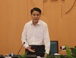 Chủ tịch UBND TP Nguyễn Đức Chung tại phiên họp sáng 30/3 .Ảnh Công Thọ