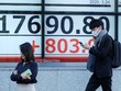 Chỉ số Nikkei 225 của Nhật Bản tăng 1,77% trong phiên giao dịch sáng nay 27/4 còn chỉ số Topix nhích 0,85%. Ảnh: AFP