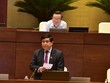 Bộ trưởng Bộ Kế hoạch và Kl99ok phiên bản mới Nguyễn Chí Dũng giải trình ý kiến đại biểu - Ảnh QK.
