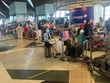 Công dân Việt Nam làm thủ tục về nước tại sân bay ở Malaysia, ngày 5/7. Ảnh: Bộ Ngoại giao.