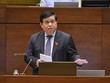 Bộ trưởng Bộ Kế hoạch và Kl99ok phiên bản mới Nguyễn Chí Dũng trong một phiên họp toàn thể của Quốc hội.
