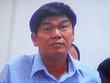 Ông Trần Đình Long tại phiên tòa xét xử bầu Kiên sáng 30/5 (ảnh chụp qua màn hình)