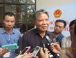 Bộ trưởng Bộ Tư pháp Hà Hùng Cường trả lời báo chí bên hành lang Quốc hội sáng nay (19/6)