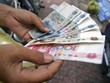 Tỷ giá trung tâm ngày 8/4 giảm 6 đồng/USD, giá vàng tăng nhẹ