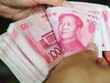 Nhân dân tệ của Trung Quốc giảm giá so với USD. 