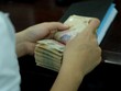 NHNN đã bơm vào hệ thống khoảng 180.000 tỷ đồng thông qua việc mua ngoại tệ, trong khi tính đến 22/7 hút ròng khoảng 116.000 tỷ đồng.
