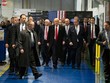 Trump và các trợ lý tới thị sát nhà máy của hãng Carrier ở bang Indiana. Ảnh: NYTimes
