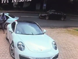 Tài xế Porsche phản ứng thần tốc thoát khỏi kẻ cướp