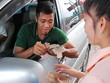 Thu phí BOT tại trạm Cai Lậy (Tiền Giang) đang gây nhiều bức xúc. Ảnh: Hoàng Nam.
