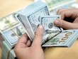 Nữ đại gia Sài Gòn sập bẫy đổi USD giá rẻ