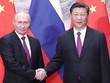 Chủ tịch Trung Quốc Tập Cận Bình (phải) bắt tay Tổng thống Nga Vladimir Putin tại Diễn đàn Kl992 cổng game cá cược Phương Đông hôm qua. Ảnh: Xinhua.