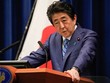 Thủ tướng Nhật Bản Shinzo Abe phát biểu trong cuộc họp báo về phản ứng của Nhật với Covid-19 tại Tokyo hôm 14/3. Ảnh: Reuters.