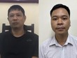 Bị can Bùi Quốc Việt (trái) và bị can Võ Việt Hùng. 