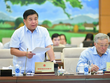 Bộ trưởng Bộ Kế hoạch và Kl99ok phiên bản mới Nguyễn Chí Dũng trình bày tờ trình dự án luật.