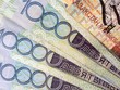 Kazakhstan thả nổi tiền tệ, đồng tenge giảm giá 23%