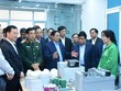 Thủ tướng Kl993 ưu đãi thưởng hấp dẫn Phạm Minh Chính và đoàn công tác tới thăm và làm việc tại Trung tâm Đổi mới sáng tạo quốc gia (NIC). Ảnh: Dũng Minh