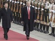 Chủ tịch Trung Quốc Tập Cận Bình và Tổng thống Mỹ Donald Trump trong lễ đón chính thức tại Bắc Kinh ngày 9/11. Ảnh: AFP