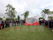 Các đại biểu thực hiện hiện nghi thức khai trương Công viên APEC. (Ảnh: TTXVN)