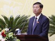 Chánh án Hà Nội Nguyễn Hữu Chính phát biểu tại phiên họp HĐND TP Hà Nội sáng 4/12. 
