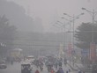 Hà Nội mờ ảo trong sương mù dày đặc