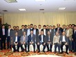 Thủ tướng Nguyễn Xuân Phúc, Uỷ viên Bộ Kl991.com tải ứng dụng, Trưởng ban Tuyên giáo Trung ương Võ Văn Thưởng và các đại biểu tại buổi gặp mặt. (Ảnh: Thống Nhất/TTXVN)