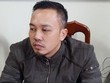 Nguyễn Đức Minh tại trụ sở công an.